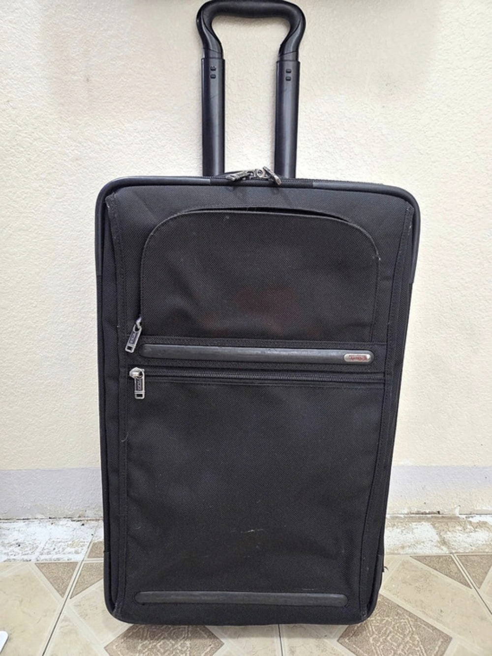 Tumi Black Rolling Travel Luggage